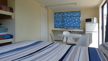 Studio interior showing kitchen area